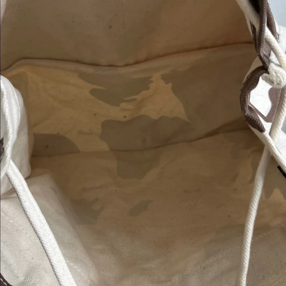 BAGGU Canvas Cow Print Backpack in Cream and Brown